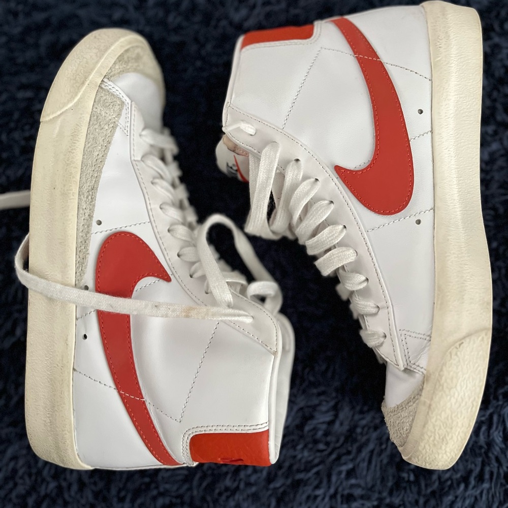 Nike White High-Top Sneakers with Red Swoosh